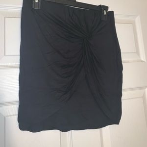 Tight fitting black skirt